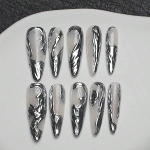 SHEIN Artificial Full Cover Diy Shiny Fake Nails Set (10pcs/Bag) With Tool Kit For Women, Including Long Pointed Shape Handmade Nail Set. The Creamy White Metallic Material Plate Comes With Irregular Three-Dimensional Metallic Design, Suitable For Daily A