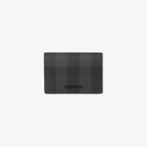 Burberry Check and Leather Folding Card CasePrice $340.00
