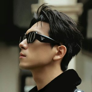 Prada Symbole oversized geometric-arm sunglasses